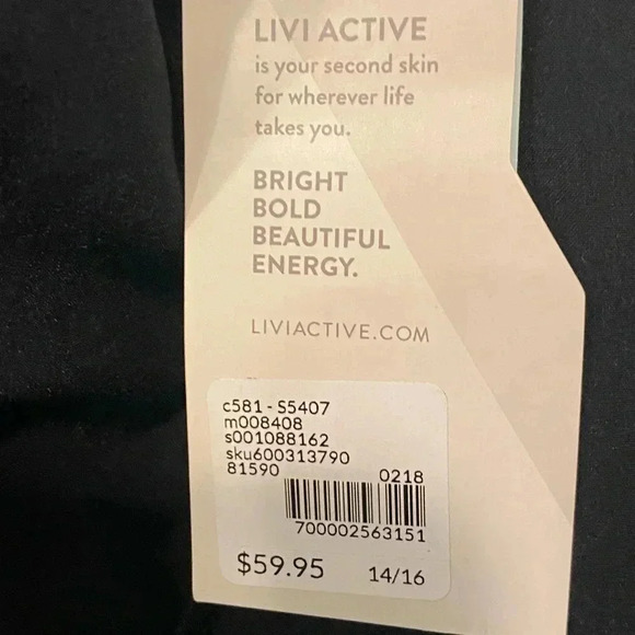 LIVI Active skirt with built in short. Adorable pleated detail in back 14/16 - Picture 4 of 6